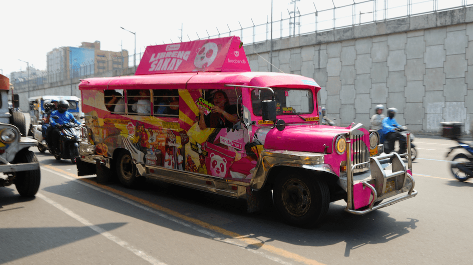 foodpanda pink jeepney offering Libreng Sakay free rides in Metro Manila as part of Panda-Malasakit Project supporting commuters along SM Fairview Cubao Monumento Baclaran and Alabang MOA routes